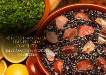 Um close-up de uma panela de feijoada completa, com couve fatiada e laranjas ao lado, traduzindo a riqueza da cozinha brasileira.